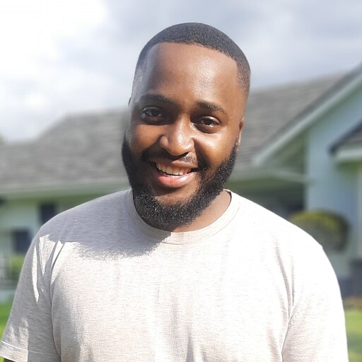Smiling man outdoors promoting scalable corporate training solutions.